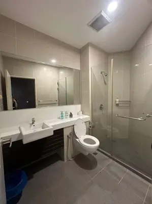 a bathroom with a shower and a toilet and a sink at 2BR, 1 Car Park, 4Pax Seaview 118IslandPlaza in Tanjong Tokong