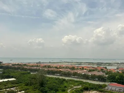 an aerial view of a city and the ocean at 2BR, 1 Car Park, 4Pax Seaview 118IslandPlaza in Tanjong Tokong