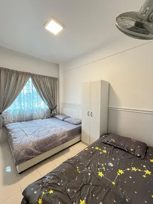 a bedroom with a bed and a window at Azzalea's Apartment Ground Floor Cameron Highlands in Tanah Rata