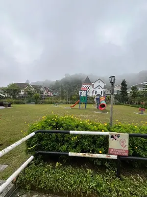 a park with a playground and a play park at Azzalea's Apartment Ground Floor Cameron Highlands in Tanah Rata