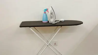 a shelf with a toothbrush and a bottle of tooth paste at Noordin ClanJetties Komtar Heritage Studio - E in George Town