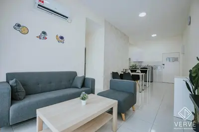 a living room with a couch and a table at Ipoh Town Anderson Suites 4-6 pax by Verve in Ipoh