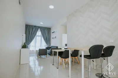 a dining room with a table and chairs at Ipoh Town Anderson Suites 4-6 pax by Verve in Ipoh
