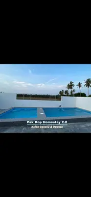 a television screen with a picture of a swimming pool at ISLAMIC Pak Kop Homestay with private pool 2 in Parit Buntar