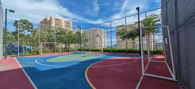 a basketball court with a net on top of it at Modern Elegance - Urban Suites by Ocean Luxe in Jelutong