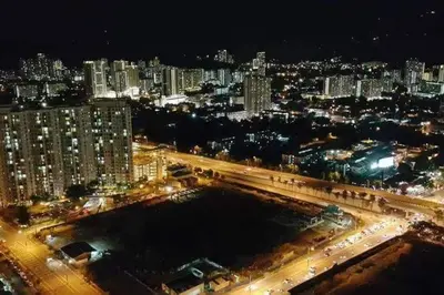 a view of a city at night with lights at Maritime Suite Penang - City & Sea view in George Town