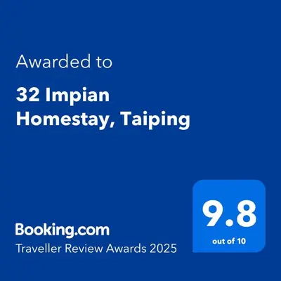 a screenshot of a phone with the text awarded indian homesteading at 32 Impian Homestay, Taiping in Taiping