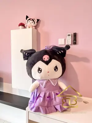 a doll in a dress sitting on a shelf at ANDERSON 2 Room Suite for 6-7 pax in Ipoh