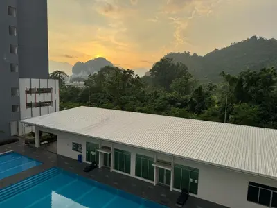a view of a building with a swimming pool at 100MBps Unifi Ipoh Anderson Residence Tatami AA2 in Ipoh