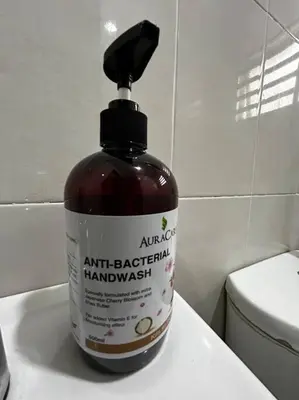 a bottle of air bacterial hand wash sitting on a bathroom counter at Matsurika Guest House - Kulim in Kulim