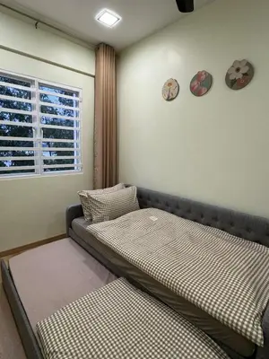 a room with two beds and a window at Tea Valley & Farm View at Cool Summer Cameron in Cameron Highlands