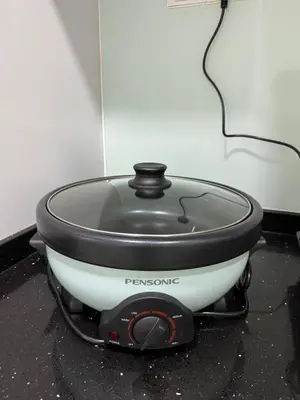 a slow cooker sitting on top of a counter at Tea Valley & Farm View at Cool Summer Cameron in Cameron Highlands