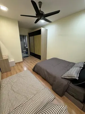 a bedroom with a bed and a ceiling fan at Tea Valley & Farm View at Cool Summer Cameron in Cameron Highlands