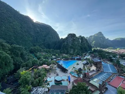 an aerial view of a resort with mountains in the background at Sunway Onsen Suite in Tambun