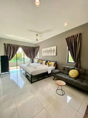 a large bedroom with a bed and a couch at LYL Journey House at Ipoh Town Centre 17PAX 6BR in Ipoh