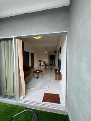 a view of a living room from the balcony of a house at DADDY HOMES 2 Emerald Avenue Centrum BRINCHANG VIEW in Brinchang