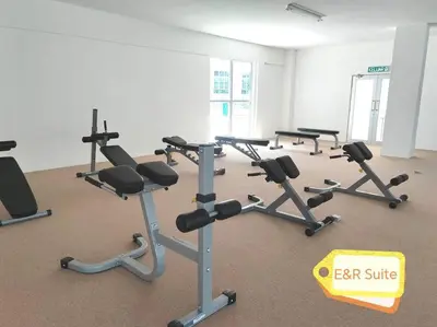 a gym with several rows of exercise bikes at Anderson, Ipoh at E&R Suite in Kampong Simee