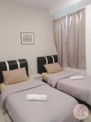 a room with three beds and a window at The Majestic Condo Ipoh Home Fairy 1 in Ipoh