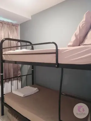 a couple of bunk beds in a room at The Majestic Condo Ipoh Home Fairy 1 in Ipoh