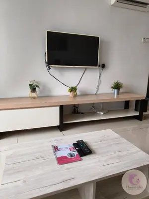 a living room with a tv and a coffee table at The Majestic Condo Ipoh Home Fairy 1 in Ipoh