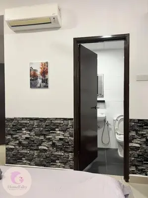 a bathroom with a toilet and a glass door at The Majestic Condo Ipoh Home Fairy 4 in Ipoh