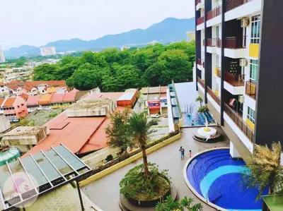 an overhead view of a building with a swimming pool at The Majestic Condo Ipoh Home Fairy 4 in Ipoh