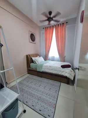 a bedroom with a bed with a ceiling fan and a window at NuTiQa Homestay Meru Ipoh Perak in Ipoh
