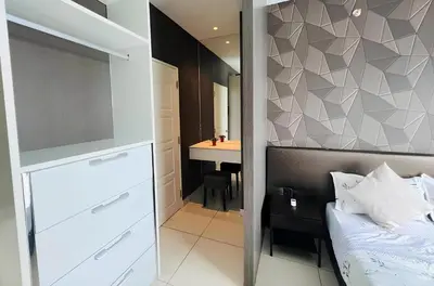 a bedroom with a bed and a bathroom with a sink at Mansion One l 5pax 1R1B l Cityview l Gleneagle l by PerfectSweetHome in George Town