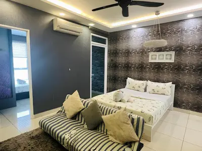 a bedroom with a bed and a couch at Mansion One l 5pax 1R1B l Cityview l Gleneagle l by PerfectSweetHome in George Town