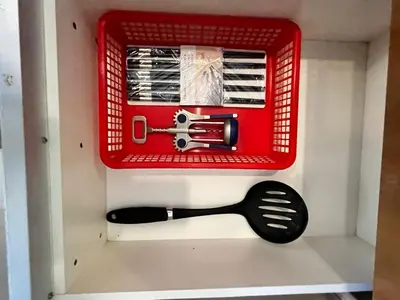 a red tool box with a spatula in it at The Retreat Mountain n Sunrise view Hilltop Hotel Apartment in Cameron Highlands in Brinchang