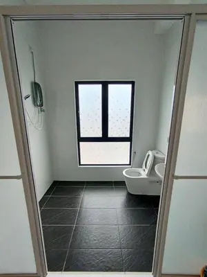 a bathroom with a toilet and a window at The Horizon Ipoh Dual L13A by Grab A Stay in Ipoh