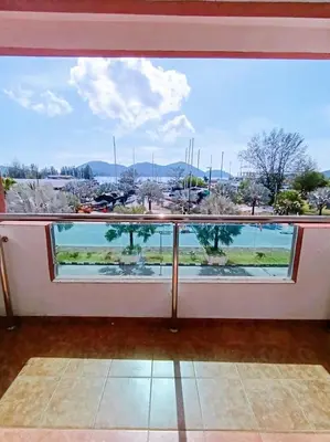 a large window with a view of the water at D'Marina 1 HOMESTAY LUMUT MANJUNG in Lumut