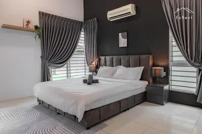 a bedroom with a large bed in a room with windows at Black & White 4BR Semi-D Home for 10 Guests with Pool Table Games & Free Netflix WiFi in Taiping