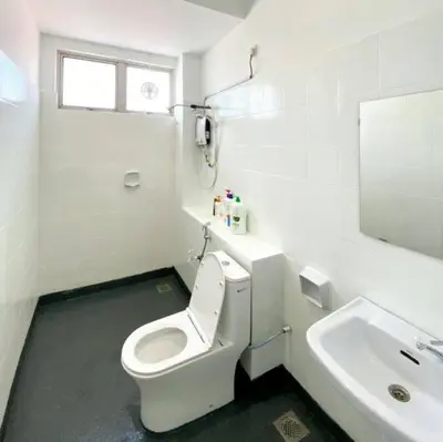 a white bathroom with a toilet and a sink at IKEA Modernism House 10Pax`Near Icon City in Bukit Mertajam