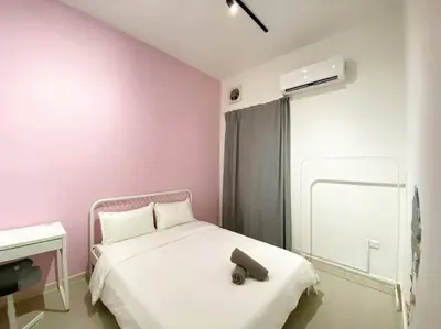 a bedroom with a white bed and pink walls at IKEA Modernism House 10Pax`Near Icon City in Bukit Mertajam