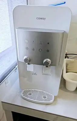a white coffee maker sitting on top of a counter at IKEA Modernism House 10Pax`Near Icon City in Bukit Mertajam