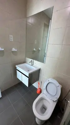 a bathroom with a toilet and a sink at Southbay Seaview Condo A10 10minQueensbay 10minSpice in Bayan Lepas