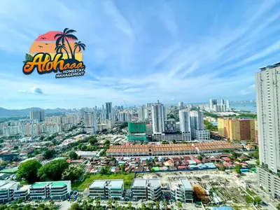 an aerial view of a city with tall buildings at Industrial Style 2 Bedroom Unit Urban Suites Georgetown Sea View Jelutong in Jelutong