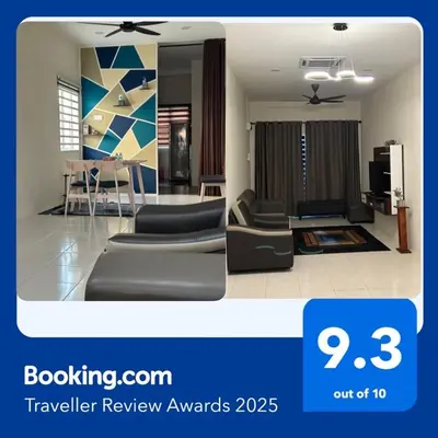 a rendering of a living room and a dining room at SKV Homestay in Teluk Intan