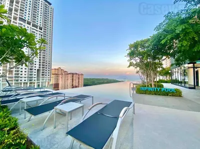 a row of blue tables and chairs on a balcony at Urban Suites #Soft creamy #Infinity Pool #local neighbourhood #4pax #2BR 2bath #2Queen #Quality well maintained #Private host in Jelutong