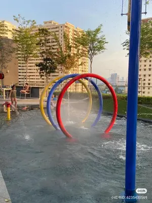 a water slide in a fountain in a city at Urban Suites TWO Or THREE Bedroom Georgetown by Annesui Cottage in Jelutong