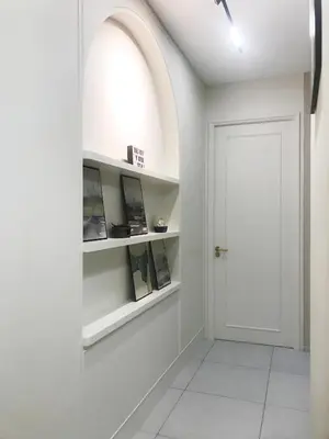 a hallway with white walls and a white door at Designer Suites 2BR Apartment in Penang near George Town Self Check-In WiFi Partial Seaview in Jelutong
