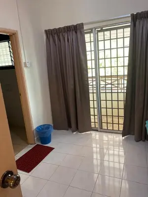 a living room with a large sliding glass door at Highlands Double Story House in Tanah Rata