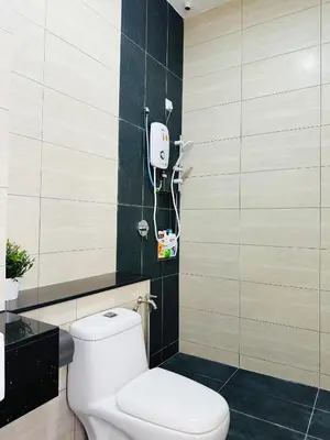 a bathroom with a white toilet and a shower at BM\u5927\u5c71\u811a Double Storey Terrace Autocity Alma Aeon Jusco Nearby in Bukit Mertajam