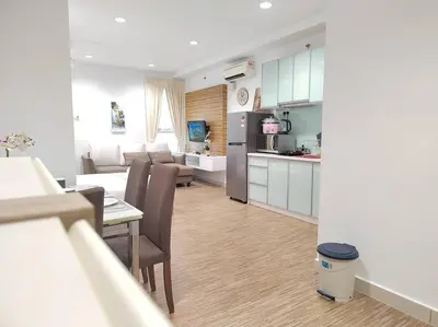 a kitchen and living room with a table and chairs at Exclusive Studio, 20th, 5pax, Gurney, Mansion One, Gleneagle Hospital in George Town