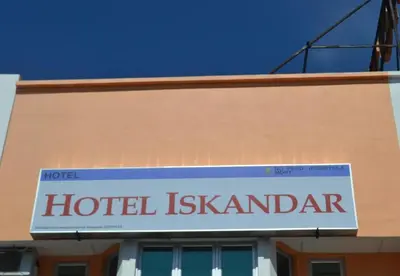 a sign for a hotel ishtararma on the side of a building at Hotel Iskandar Perak in Seri Iskandar