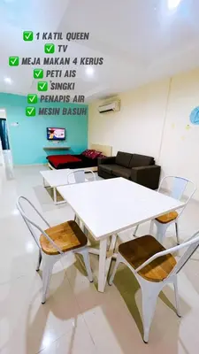 a white table and chairs in a room at D'Marina 2 HOMESTAY LUMUT MANJUNG in Lumut