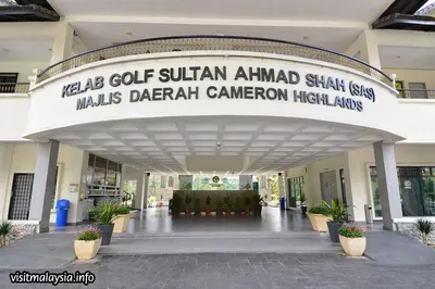 a building with a sign that reads akle golf sudanandan animalshaks at Iris Bougainvillea Cameron's in Tanah Rata