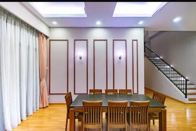 a dining room with a table and chairs at 16celsius at Kea Farm Brinchang in Brinchang