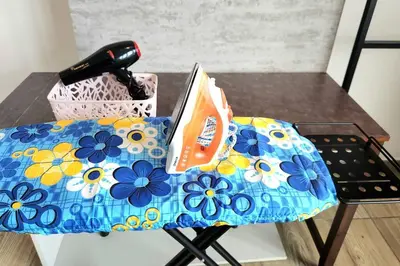 a table with a book and a knife at Ipoh City Centre 八角楼 OCTAGON Homestay - 2 mins walking to famous food & 15 mins to Old Town Ipoh by Happy Homestay in Ipoh